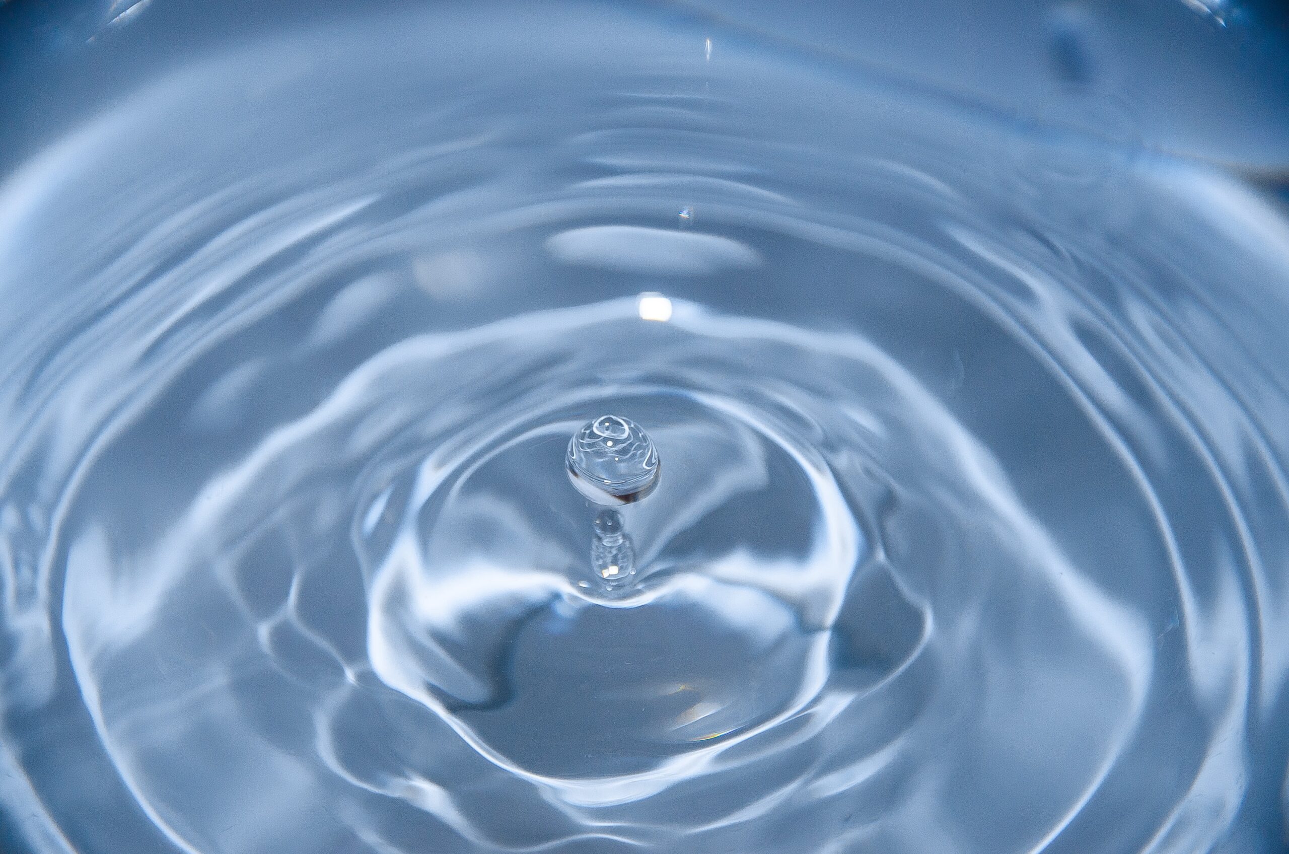 water droplet touches water surface